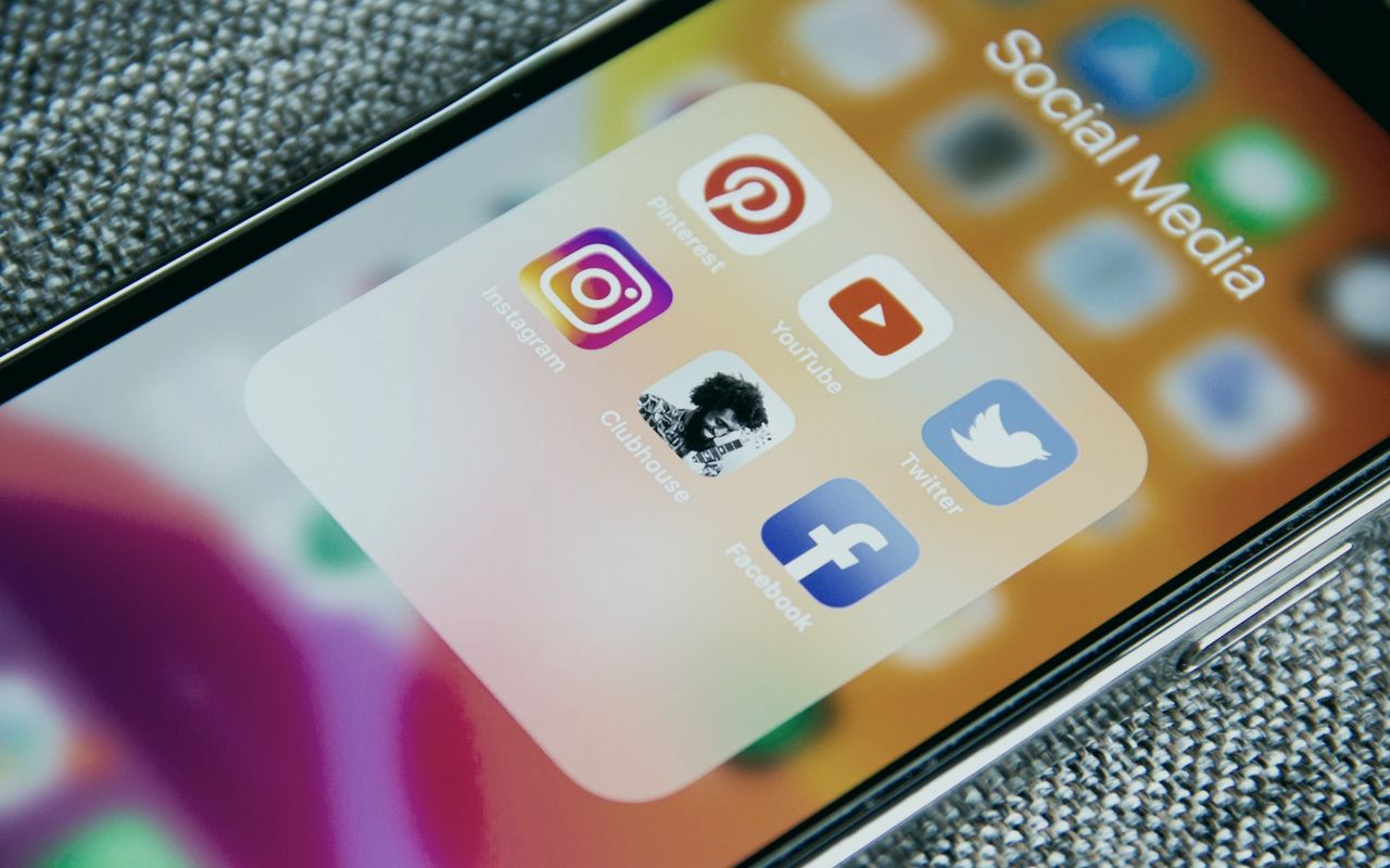 A phone screen showing a folder of social media apps